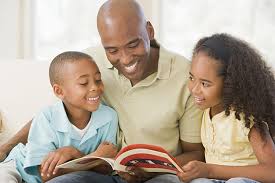 father reading with children